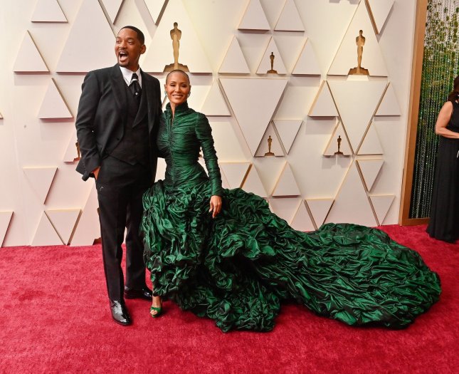 Will Smith appears to punch Chris Rock at the Oscars