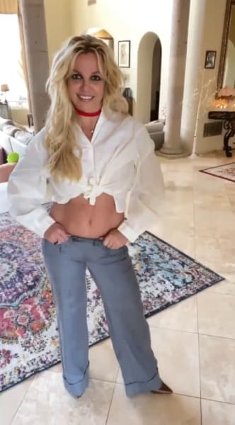 Britney Spears' Baby Bump in a White Tied-Off Blouse