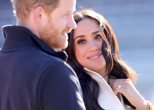 Meghan Looks at Harry