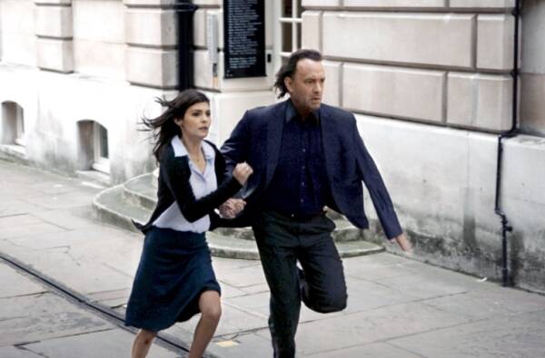 Hanks with Audrey Tautou in “The Da Vinci Code” (2006). Columbia Pictures,