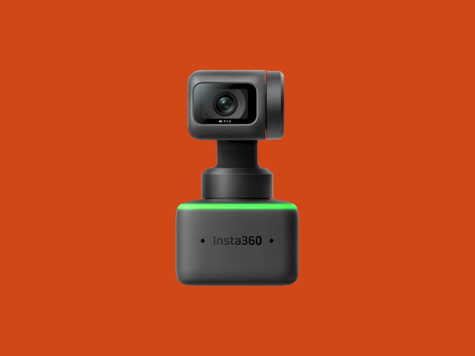 Insta360 Link camera on orange backdrop