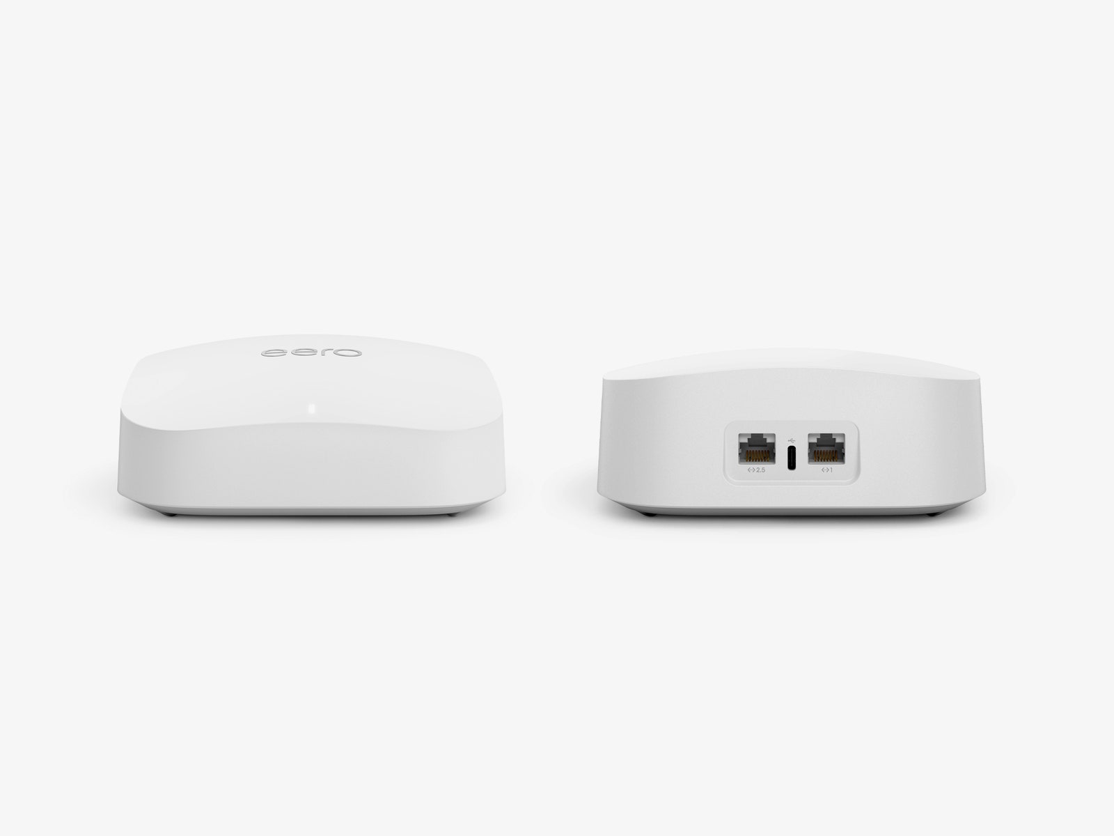 Eero Pro 6E routers side by side showing the front and back of the device