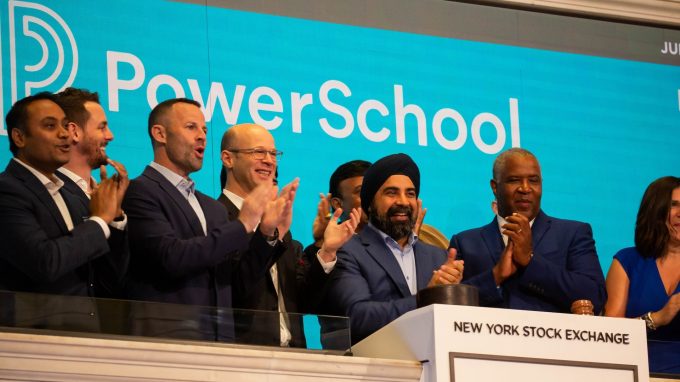 Hardeep Gulati, chief executive officer of PowerSchool, center right, rings the opening bell on the floor of the New York Stock Exchange (NYSE) during the company's initial public offering (IPO) in New York, U.S., on Wednesday, July 28, 2021.