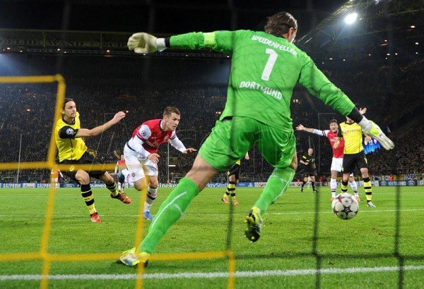 It Took an Aaron Ramsey Effort to Seal a 1-0 Win in Dortmund Last Season. Image: Arsebal via Getty. 