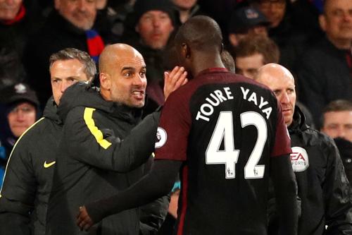 Pep Guardiola and Yaya Toure