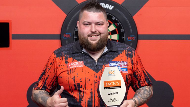 Smith celebrates his Dutch Darts Championship triumph 