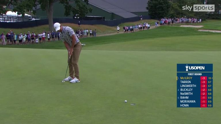 Rory McIlroy sinks his birdie putt at the 8th hole to take the outright lead at the U.S. Open. 