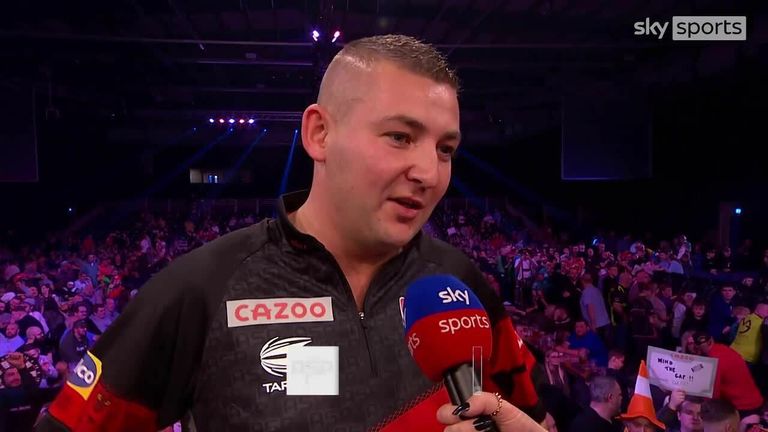 Nathan Aspinall couldn't hide his delight after beating Peter Wright to top Group E