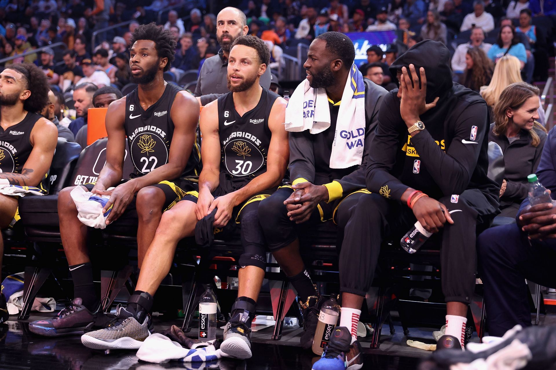 Steph Curry and Andrew Wiggins are both listed as out on the NBA injury report (Image via Getty Images)