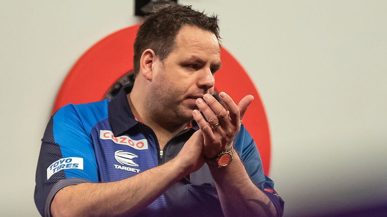 Adrian Lewis was dumped out of the World Darts Championship after an impressive performance by Damon Heta