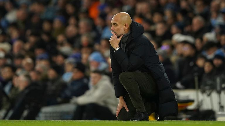 Manchester City&#39;s head coach Pep Guardiola watches during the English FA Cup soccer match between Manchester City and Chelsea at the Etihad Stadium in Manchester, England, Sunday, Jan. 8, 2023. (AP Photo/Dave Thompson)