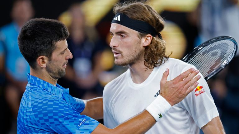 Novak Djokovic of Serbia, left, meets Stefanos Tsitsipas of Greece at the net after Djokovic won the men&#39;s singles final at the Australian Open tennis championships in Melbourne, Australia, Sunday, Jan. 29, 2023. (AP Photo/Asanka Brendon Ratnayake)