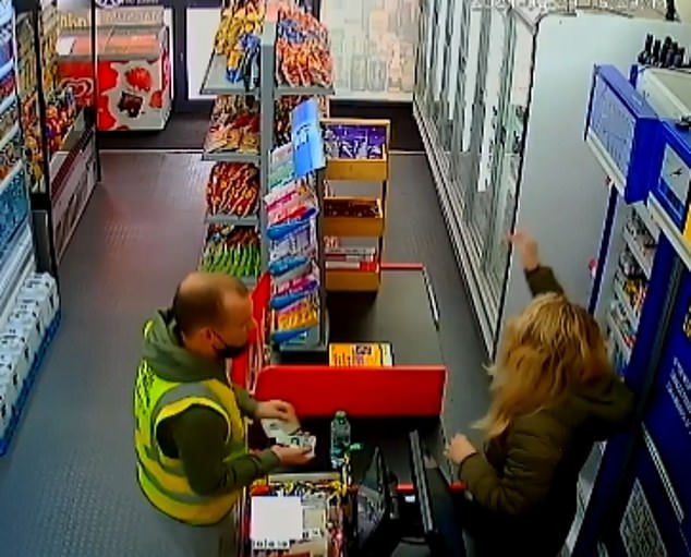 CCTV shows the moment a thief fooled a shopkeeper into handing over £10 by quickly pocketing change she had already given him and then telling her she owed him money. The scam took place in the Local Off-Licence on the Holloway Road in Islington, North London, on Sunday