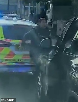 This is the moment a female Met officer is crushed by an undercover police car during a robbery chase in South London today