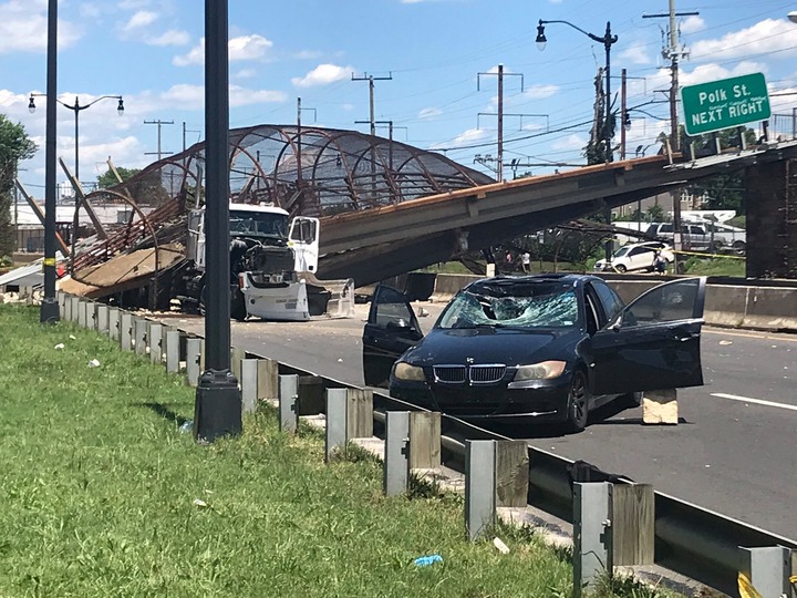 5 people hospitalized after pedestrian bridge collapses onto DC highway (photos)