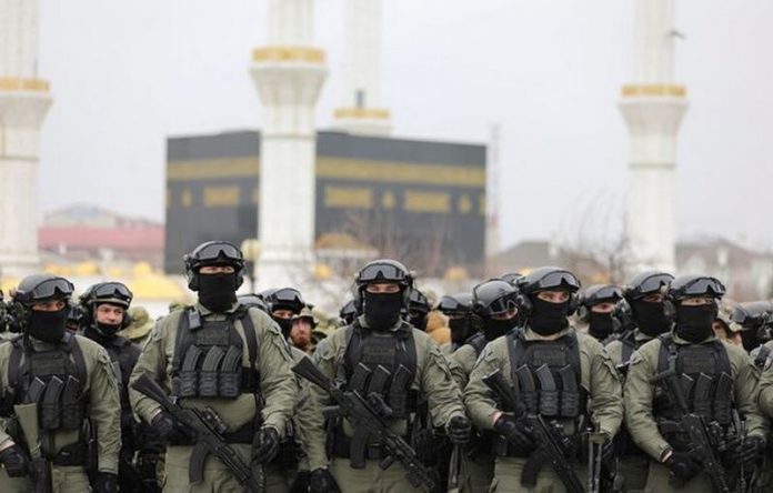 Russian service members gather during head of the Chechen Republic Ramzan Kadyrov's address, dedicated to a military conflict in Ukraine ( Image: REUTERS)