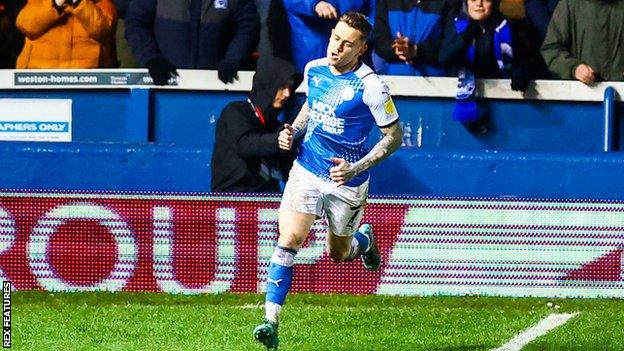 Sammie Szmodics runs away to celebrate after scoring his fourth goal of the season