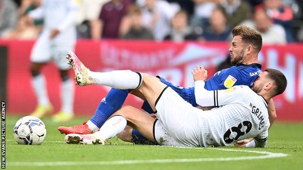 Swansea's Matt Grimes and Cardiff's Joe Ralls tangle during the most recent south Wales derby