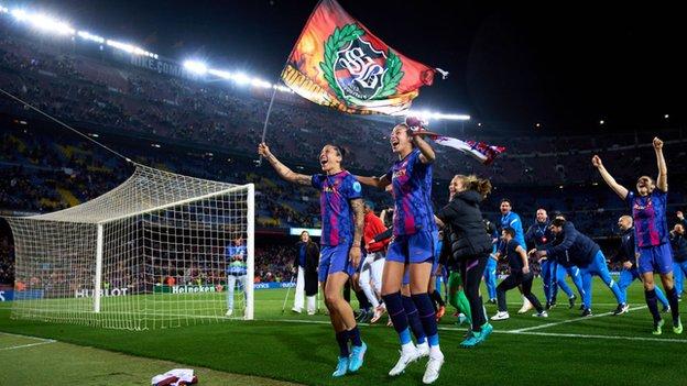 Players celebrate at Nou Camp