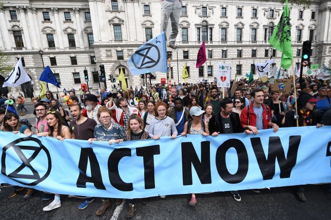 Climate activists demand end to fossil fuels as they block London bridges