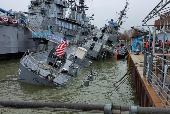 Crews work to fix sinking decommissioned destroyer USS The Sullivans