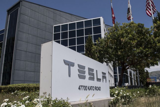Judge cuts $137M awarded to Tesla employee in discrimination suit to $15M