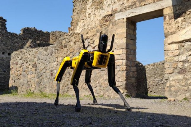 Robot dog patrolling the ruins of ancient Italian city Pompeii