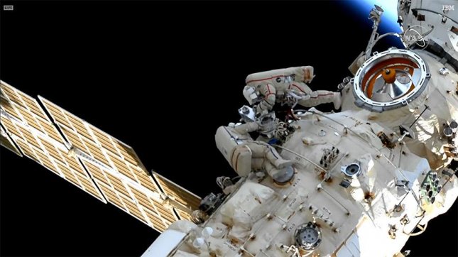 Russian cosmonauts activate robotic arm on ISS during spacewalk