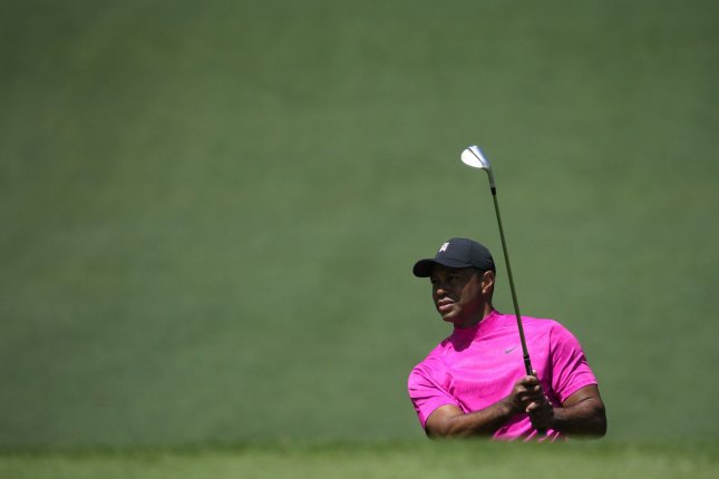 Tiger Woods cards three first-round birdies, in striking distance at Masters