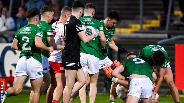 Tyrone and Fermanagh players tussle during the closing stages of the Ulster SFC opener at Brewster Park