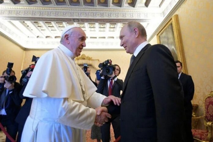 Russian President Vladimir Putin meets Pope Francis at the Vatican