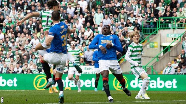 Jota (left) scores Celtic's winning goal