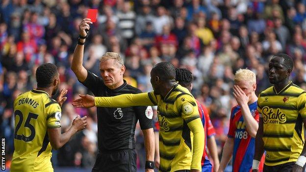 Hassane Kamara is sent off by referee Graham Scott