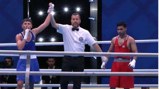 Dylan Eagleson celebrates after his semi-final victory over Bulgaria's Daniel Panev Asenov