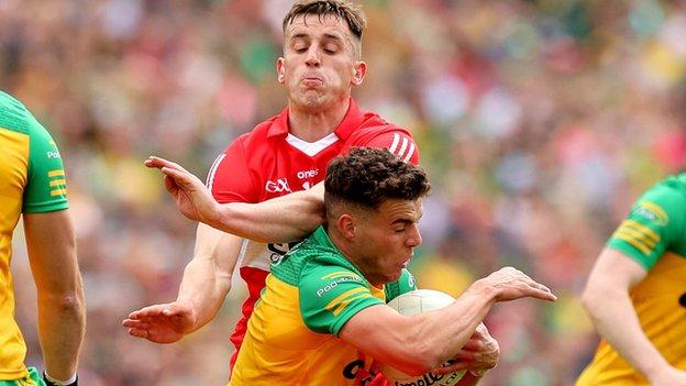 Donegal goalscorer Odhran McFadden Ferry battles with Derry's Shane McGuigan