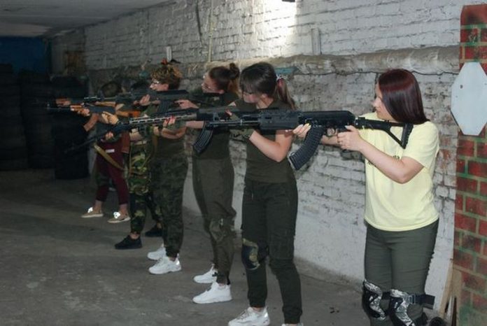 Women learn how to use Kalashnikov assault rifles in Zaporizhzhia, southeastern Ukraine ( Image: AFP via Getty Images)