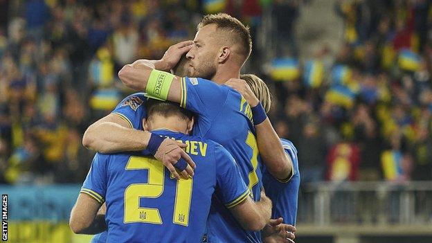 Ukraine players celebrate their equaliser