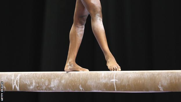 A gymnast on the beam