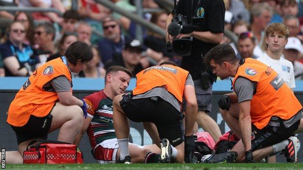 Leicester Tigers' George Ford gets treatment on an injury