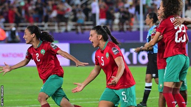 Morocco players celebrate beating Nigeria at the Women's Africa Cup of Nations