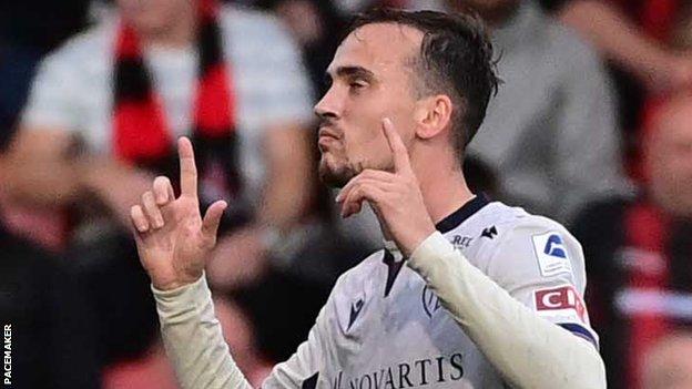 Liam Millar celebrates scoring the opener for Basel in north Belfast