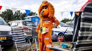 An F1 fan dressed as a lion