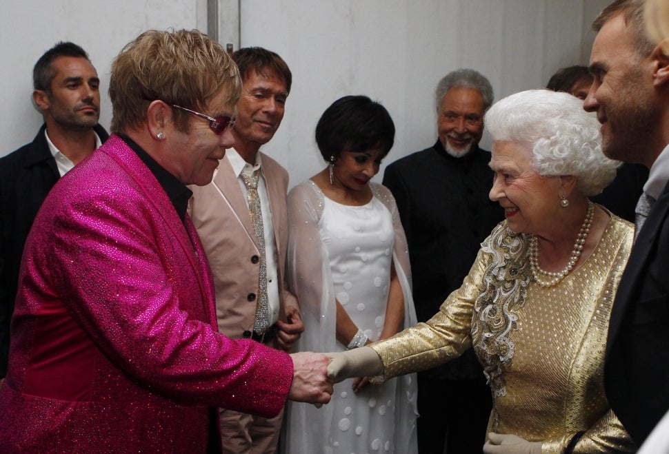 Elton John and Queen Elizabeth II