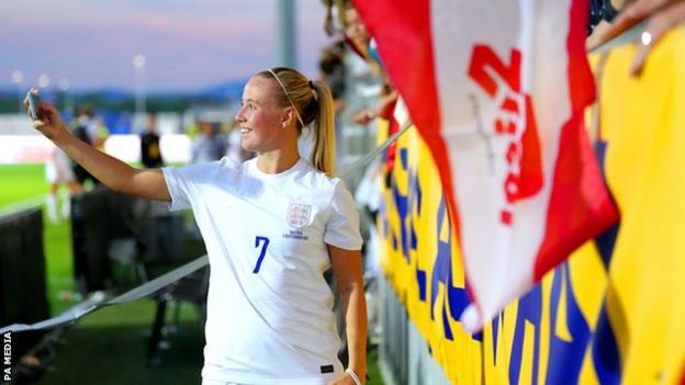 England's Beth Mead has a selfie with fans after the 2-0 win over Austria