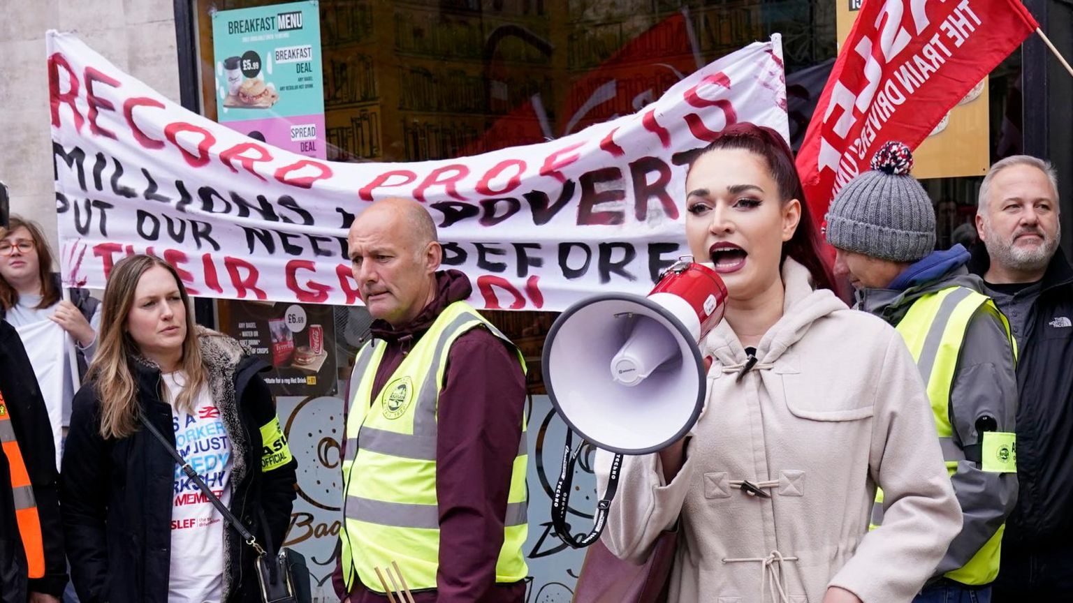 people protest and strike on the picket line