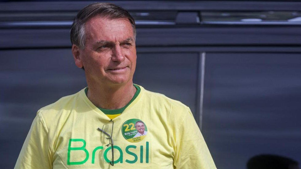 Brazil's President and presidential candidate Jair Bolsonaro looks on at a polling station in Rio de Janeiro, Brazil October 30, 2022.