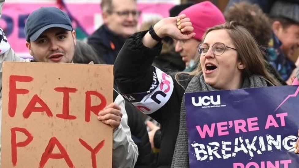 Staff protest outside Queen's University in Belfast