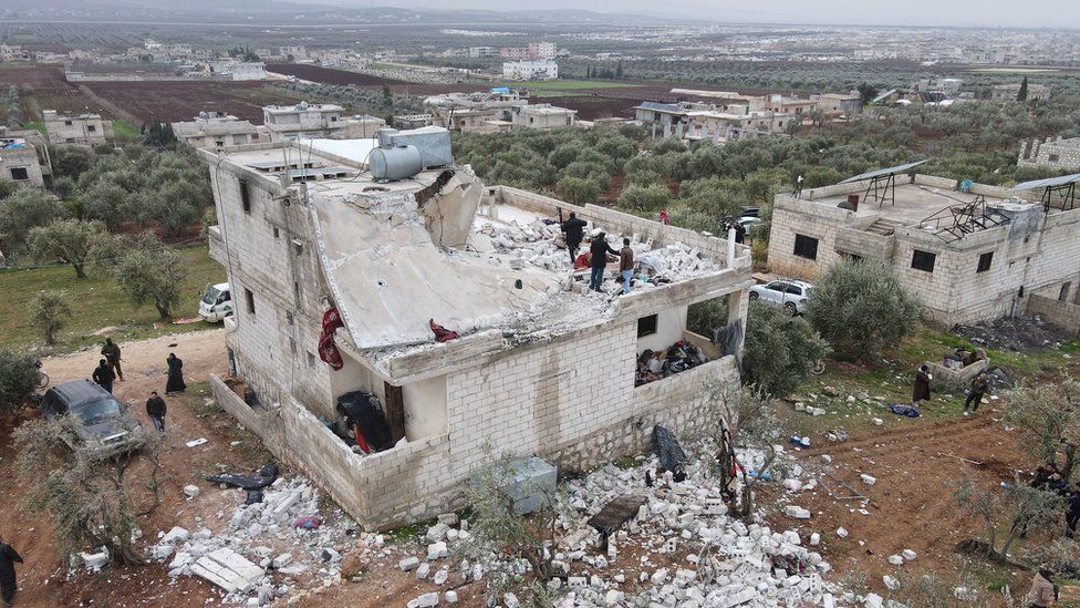 A damaged building is seen after a US special forces raid in Atmeh, Syria (3 February 2022)