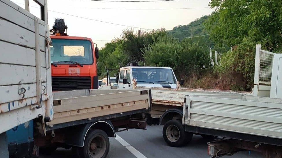 Vehicles block the road as security measures taken around the city while air raid sirens heard along near the Kosovo/Serbian border on July 31, 2022