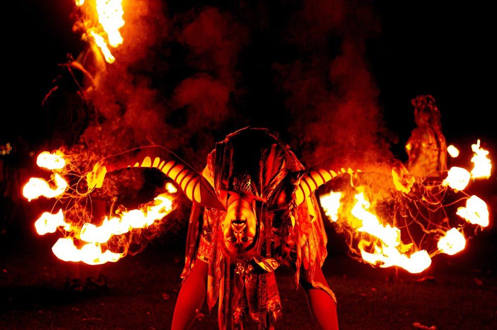 A member of the Beltane Fire Society takes part in the Samhuinn Fire Festival in Edinburgh